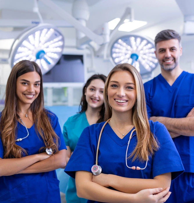 smiling dental team of orthodontists and clinic staff at IQ Braces and Faces