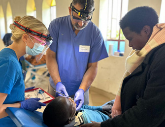 Dentist providing free dental treatment